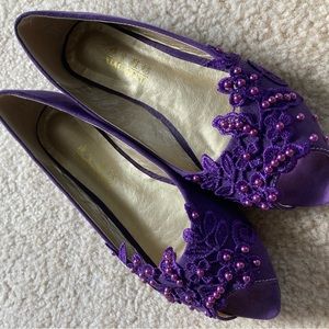 Purple peep-toe flats, with lace detail. Size 8.